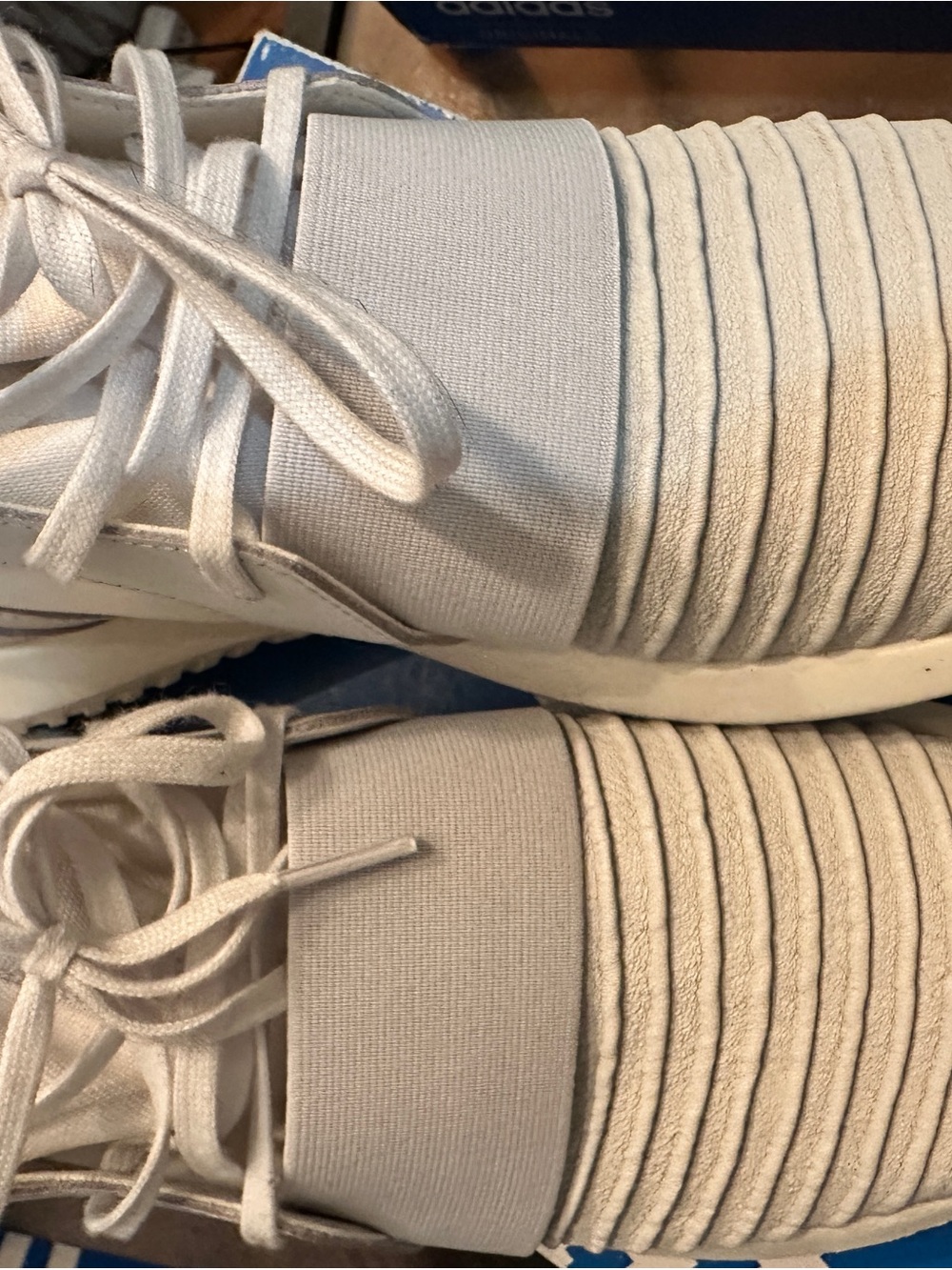 White Adidas Leather Tubular Defiant Women’s Slip-On Athletic Sneakers